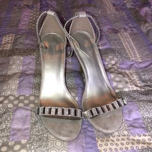 Candies silver heels. Worn 2 times for dances